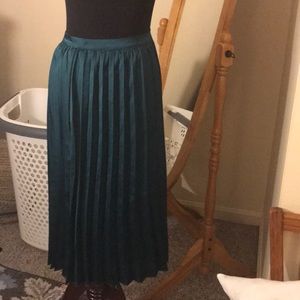 Dark green pleated skirt